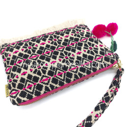 Neceser multiusos Artebene en colores vivos en colores fucsia y negro de mujer